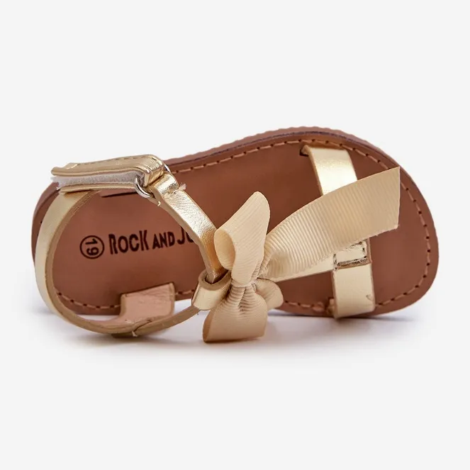 Children's sandals with a Velcro bow, gold Joratia golden